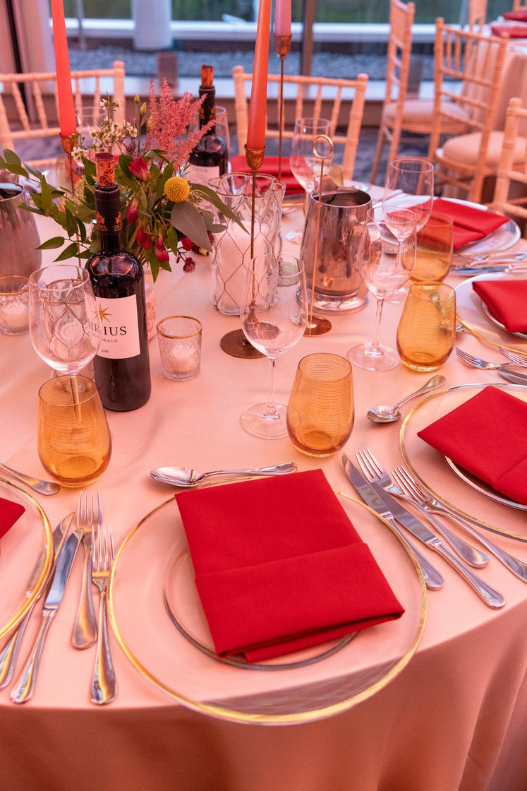 Table styling detail with candles and foliage