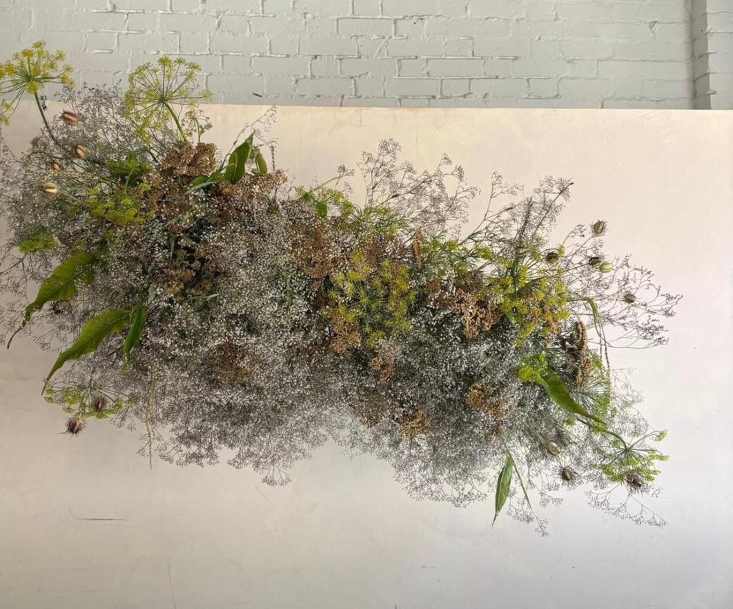 A dried and preserved arrangement laid flat